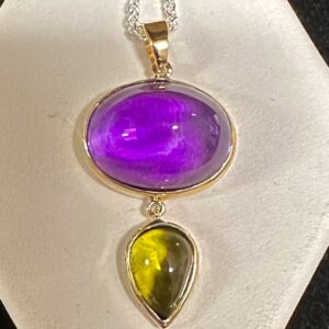 Amethyst oval cabochon and teardrop peridot pendant with 20 inch adjustable silver chain